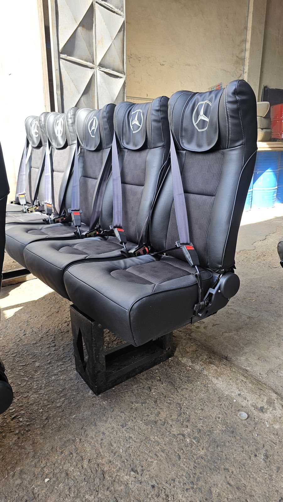 Embossed headrests with marque detailing